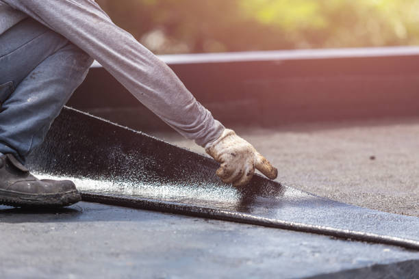 Professional Waterproofing technician working in Lexington, IN